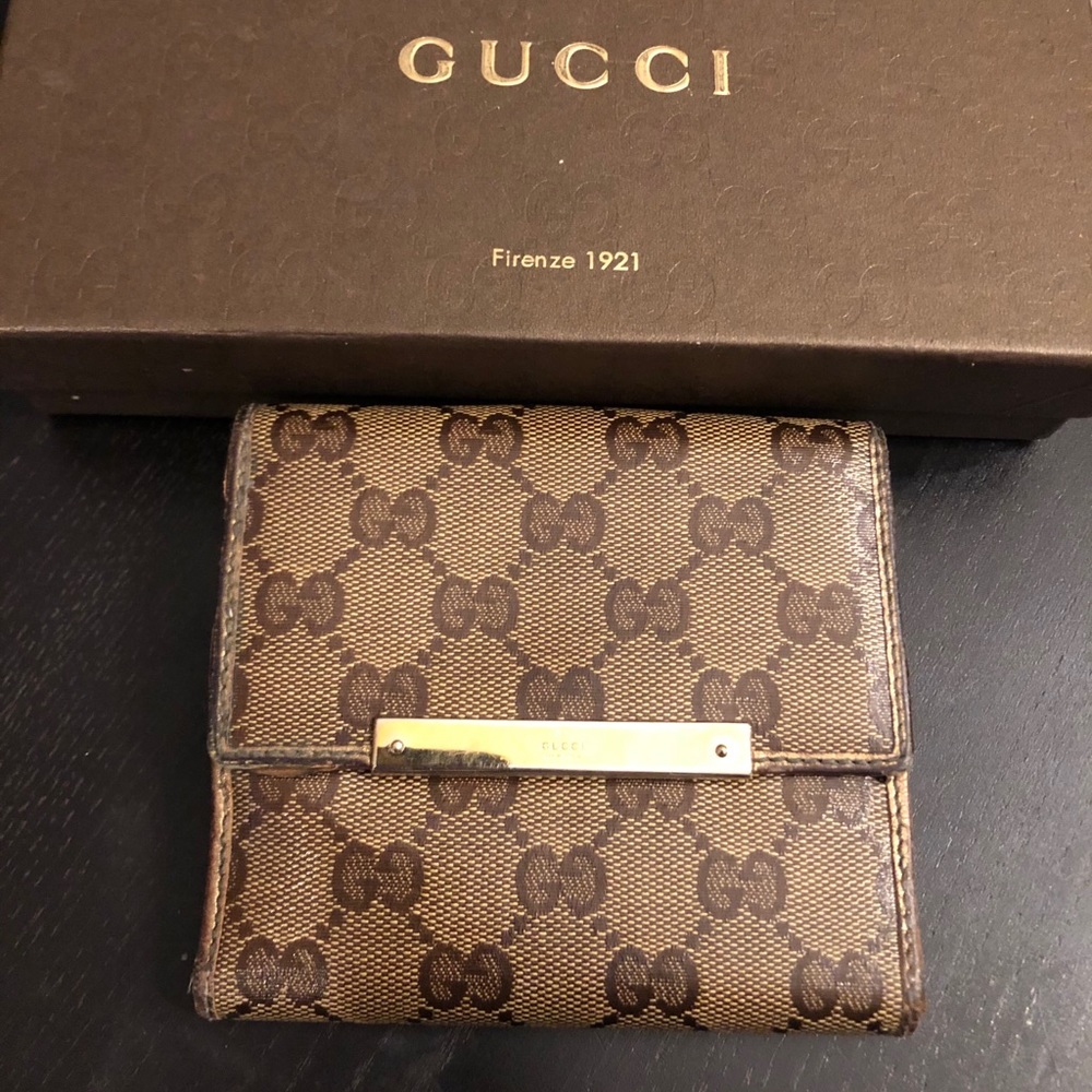 Authentic GUCCI gold monogram bifold wallet